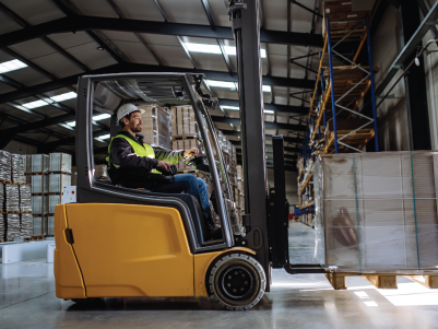 Fork Lift driver in a factory